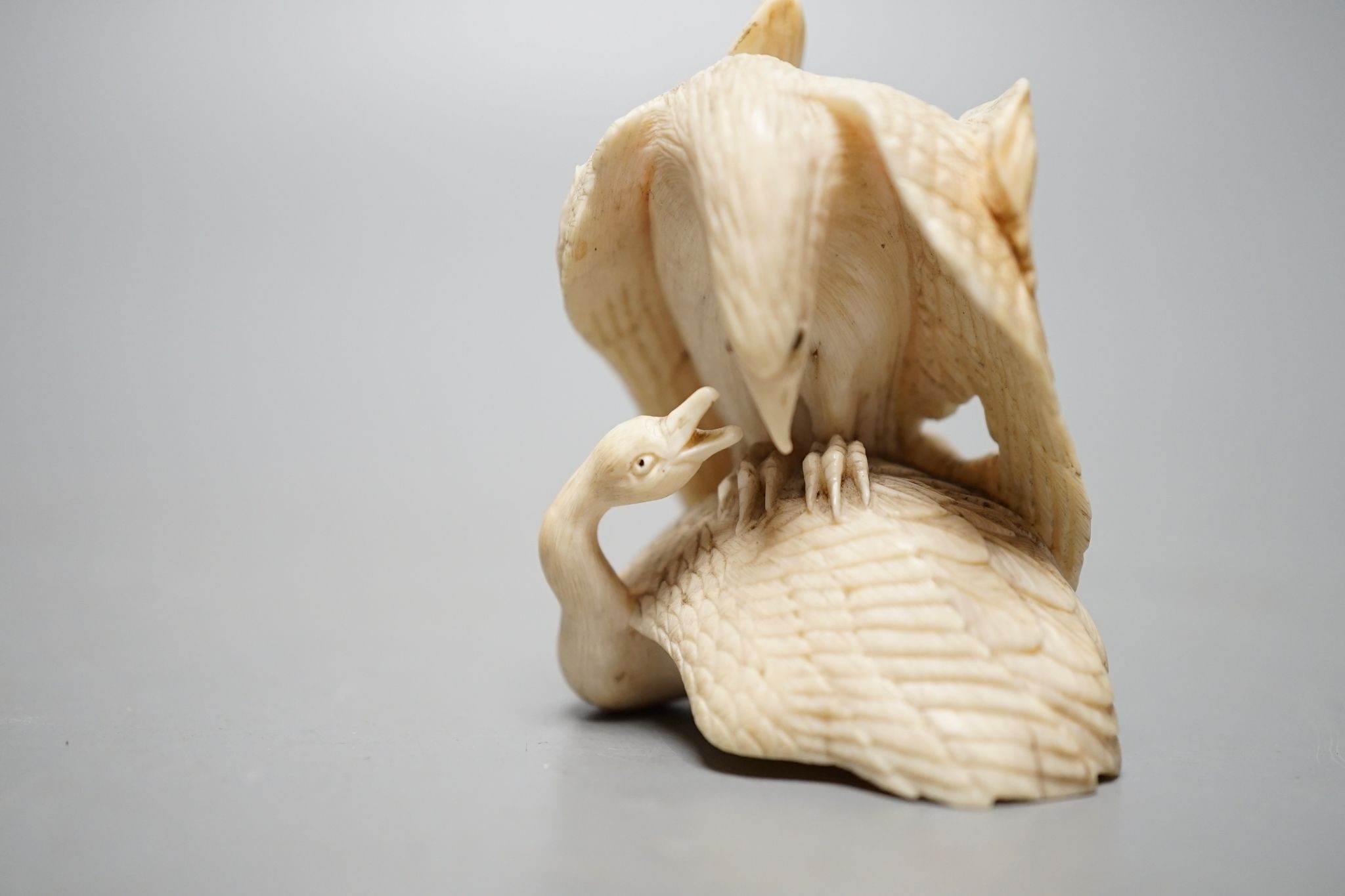 A Japanese ivory eagle and goose okimono, 5.5cm